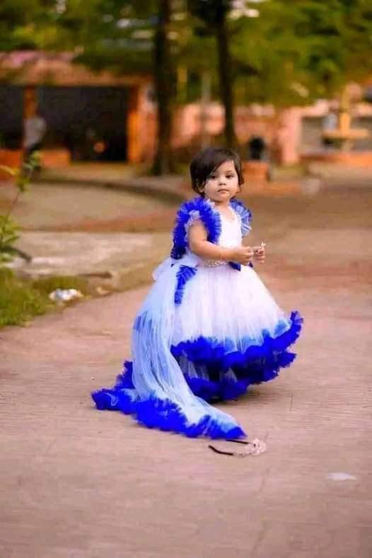 Baby Party Dress  ফেব্রিক্সঃ এসি নেট কাপড়। বডিতে পুতির কাজ করা (১০-১২ বছর)